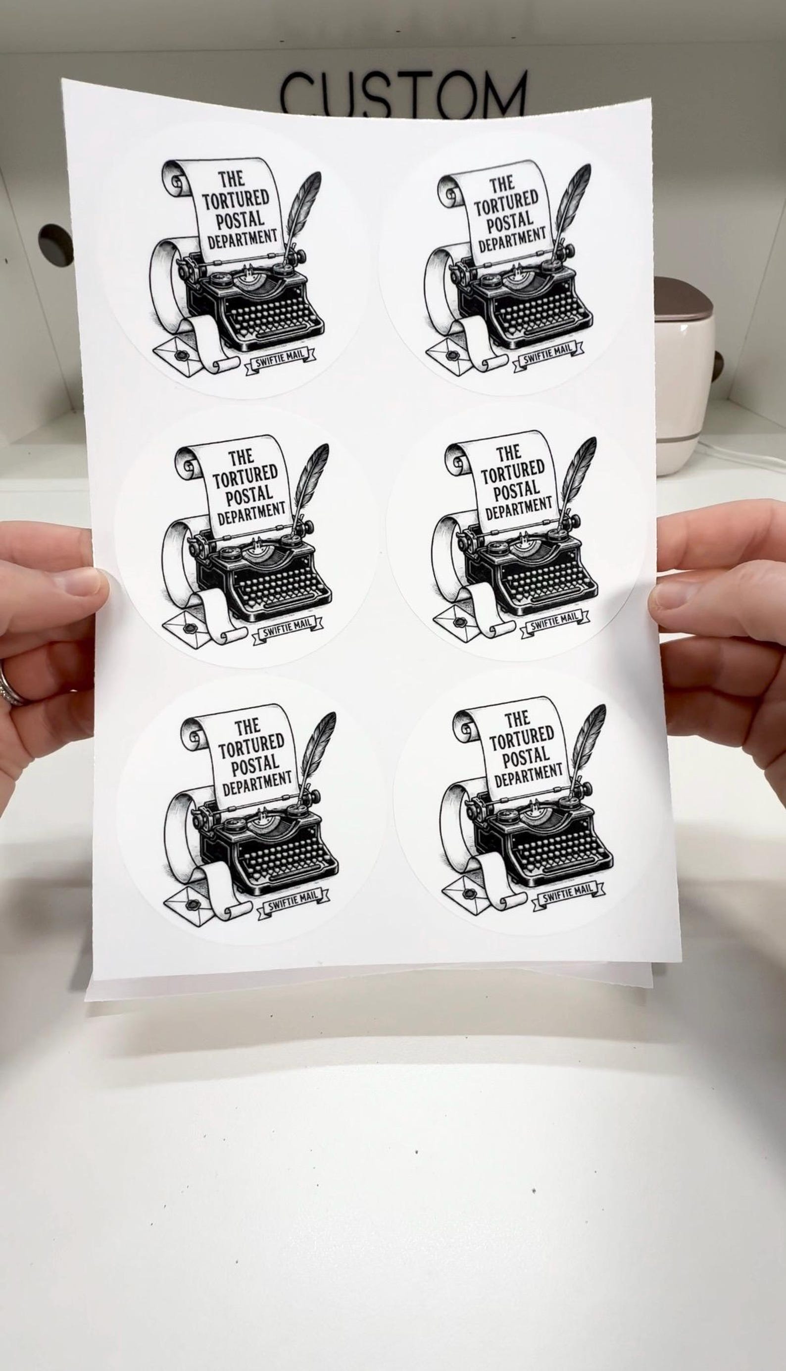 Typewriter-themed custom stickers arranged on a sheet